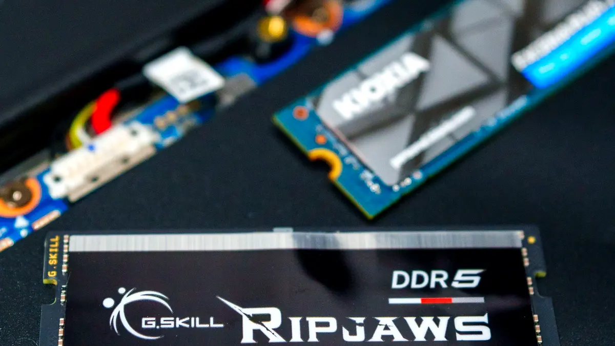 A G.SKILL Ripjaws DDR5 memory module seated in a motherboard slot.