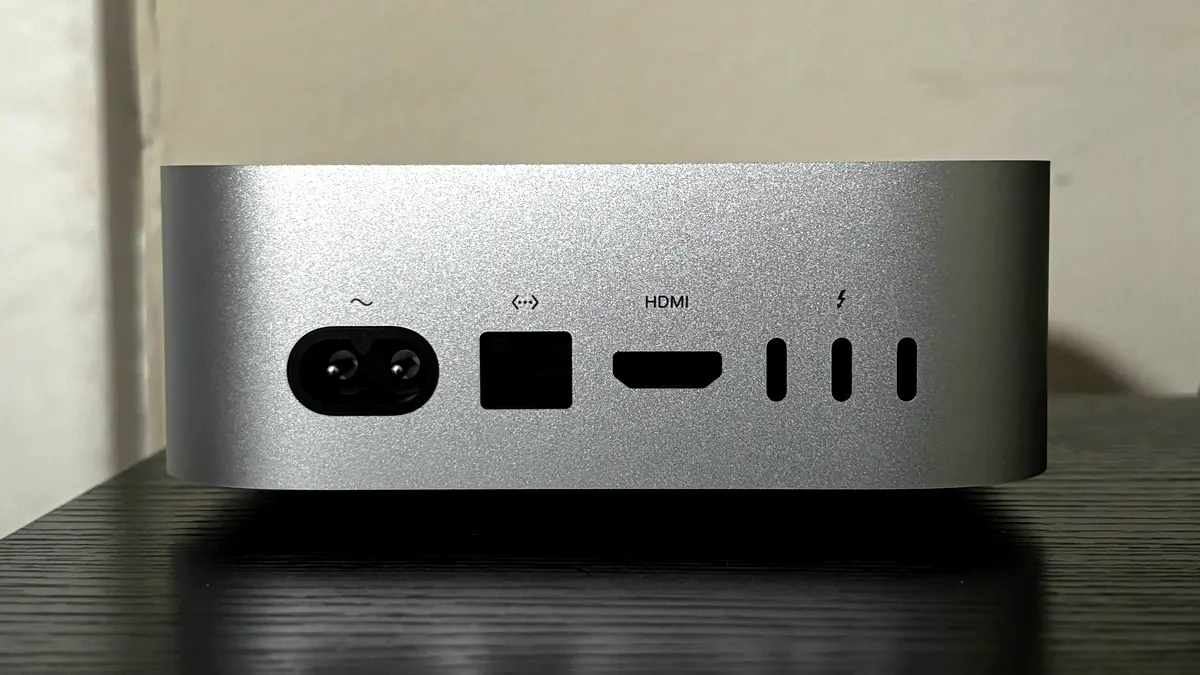 The rear panel of an Apple Mac mini (M4), showing its Thunderbolt, HDMI and Ethernet ports.